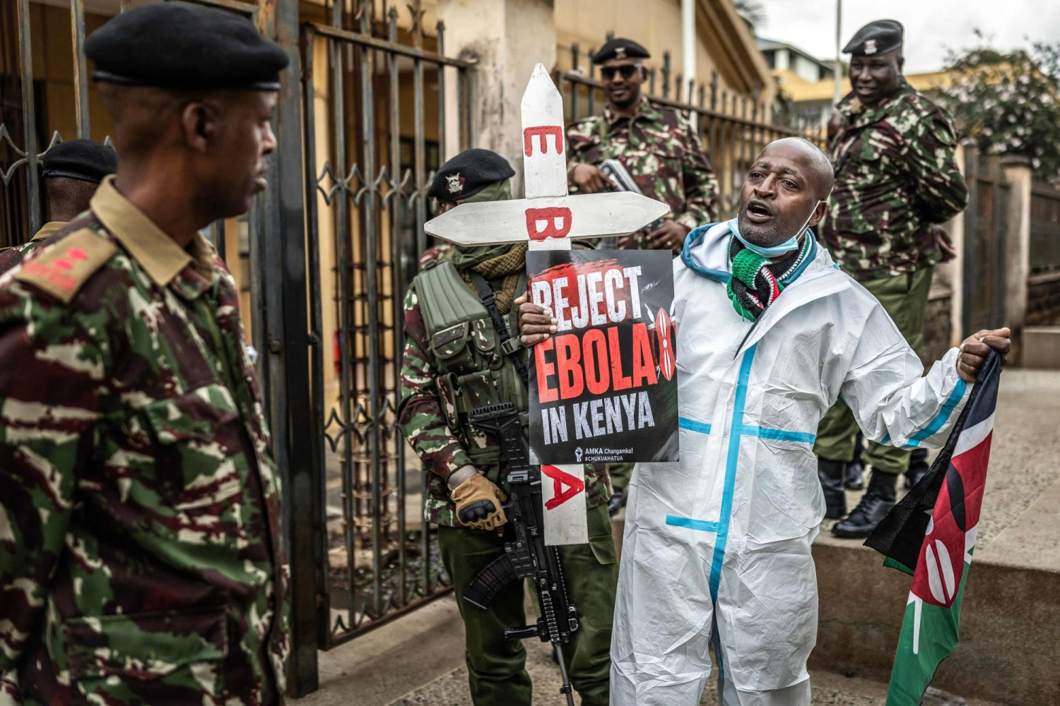 Human Rights Activist John Kamau demonstrates against US-Kenya Ebola Deal outside the Milimani Law Courts Human Rights Activist John Kamau demonstrates against US-Kenya Ebola Deal outside the Milimani Law Courts