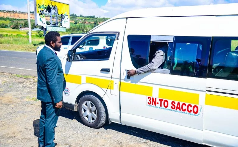 Sammy Waweru boarding Matatu to Nairobi.