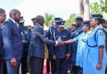 Ruto Defends New Police Uniforms, Urges Fact-Based Scrutiny. President Ruto alongside Police women dressed in new uniforms
