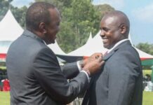 I fought Ebola in Liberia; It is not a Death Sentence. Dr. Komu Mutunga being awarded by President Uhuru Kenyatta